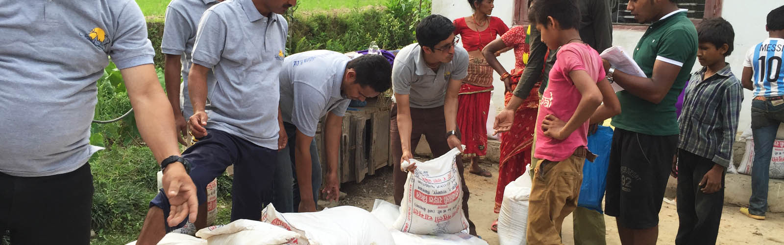 Distributing Rice Sacks to the victims of the Earthquake..
